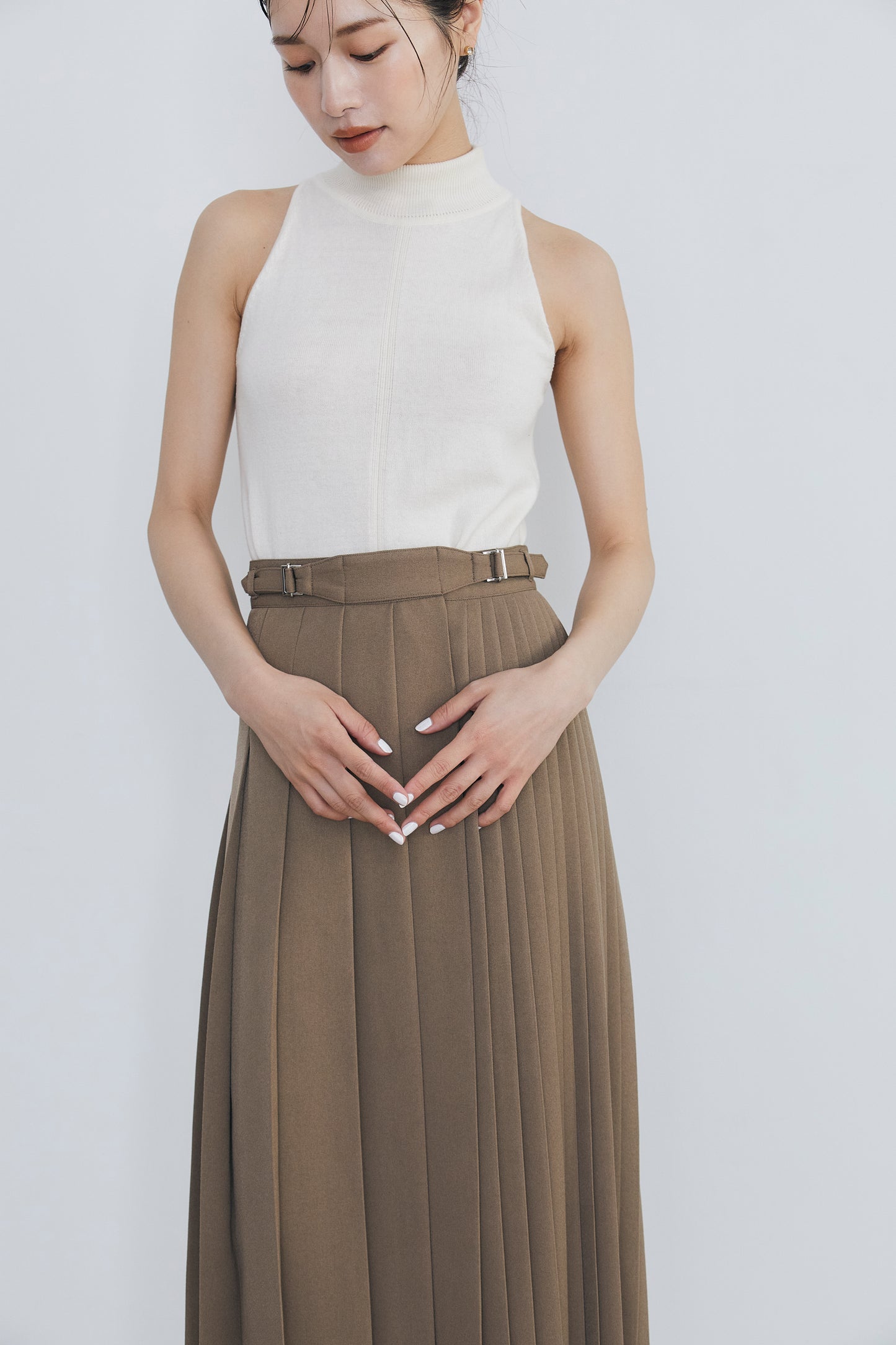 Asymmetry pleats skirt
