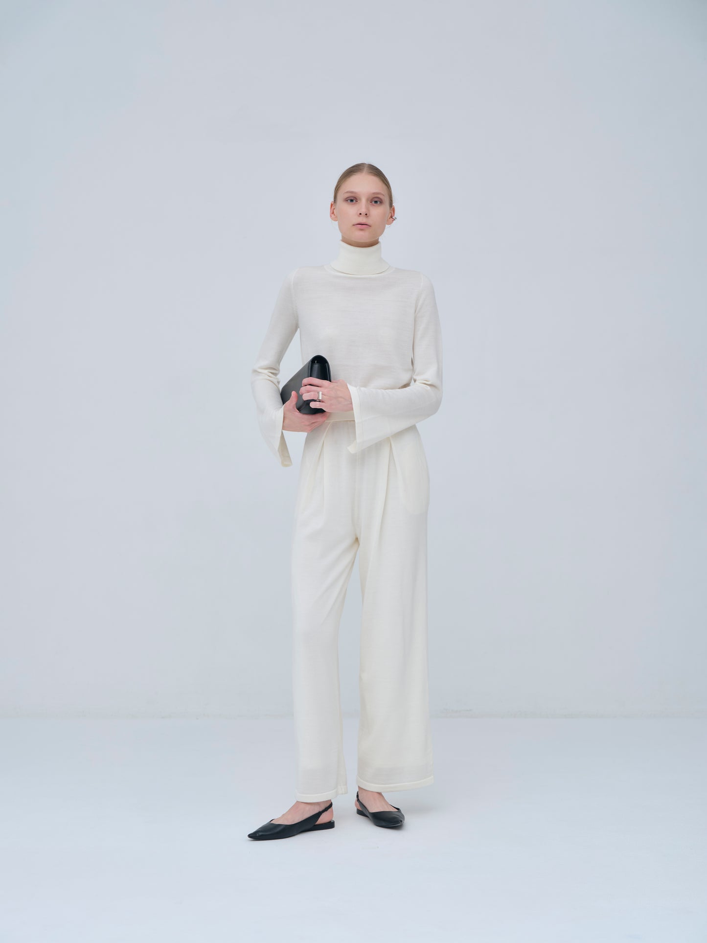 Compact Slit Sleeve Knit