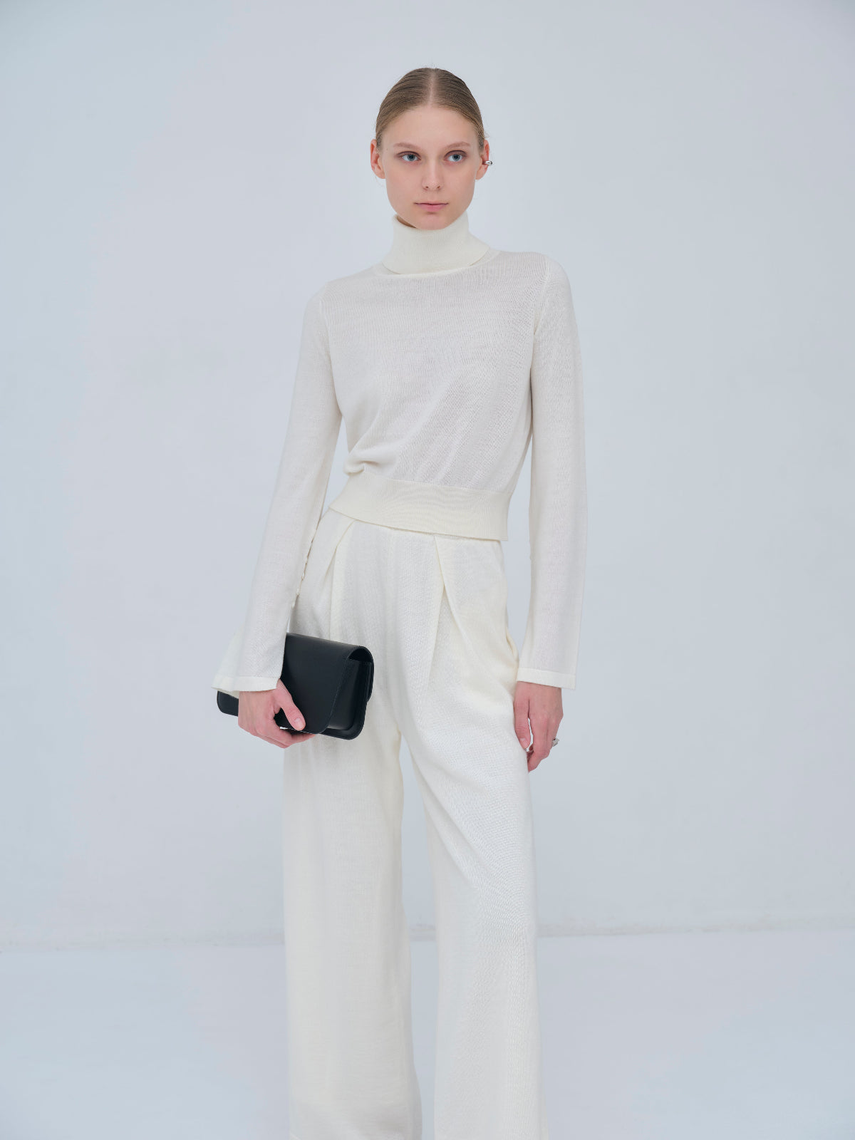 Compact Slit Sleeve Knit
