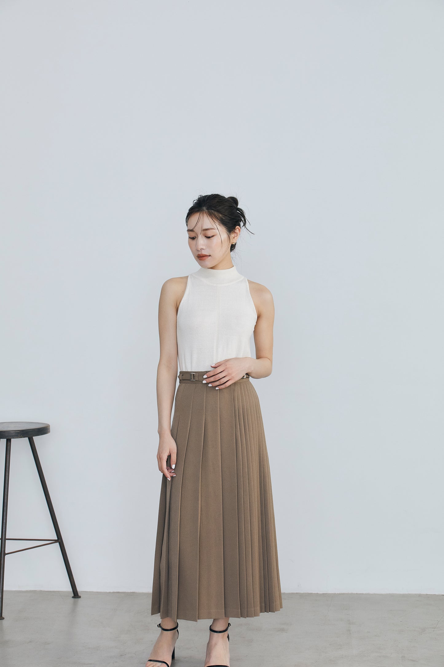Asymmetry pleats skirt