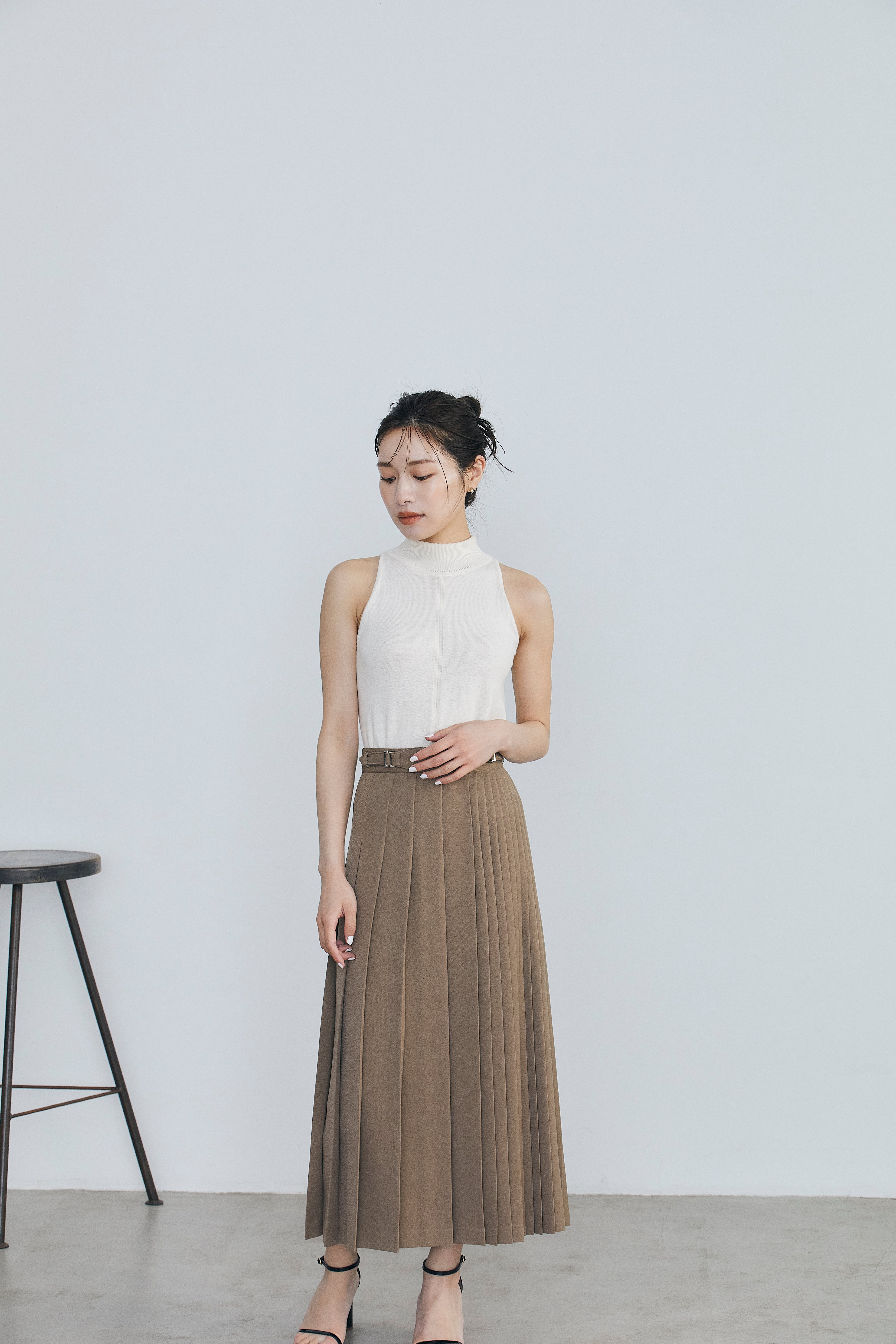 Asymmetry pleats skirt