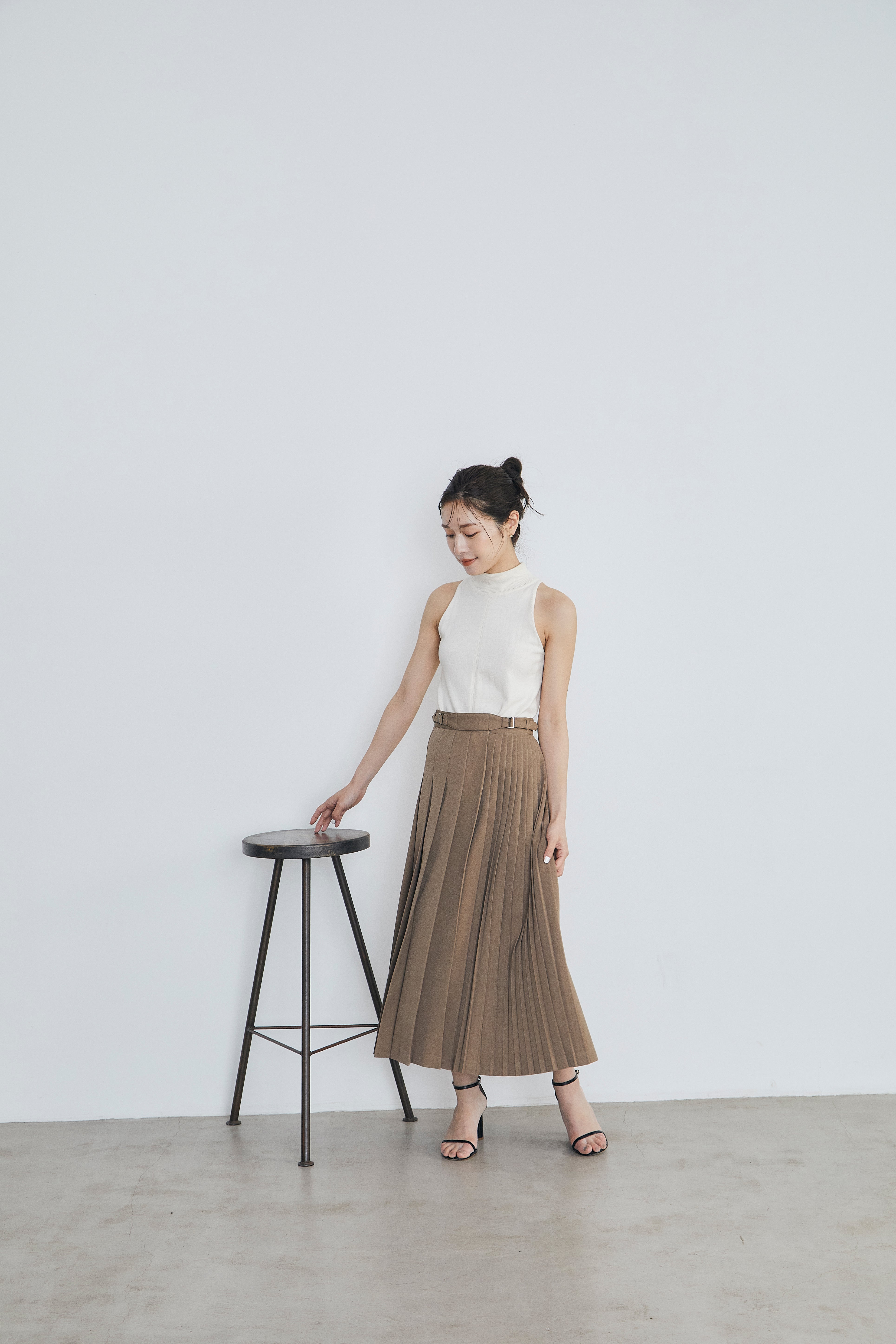 Asymmetry pleats skirt