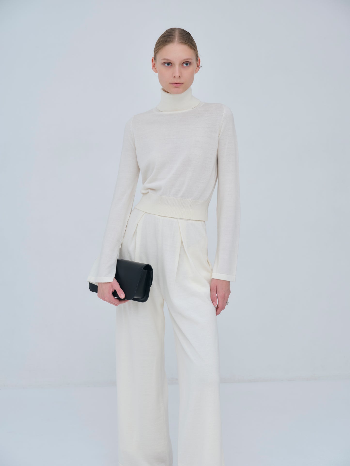 Compact Slit Sleeve Knit