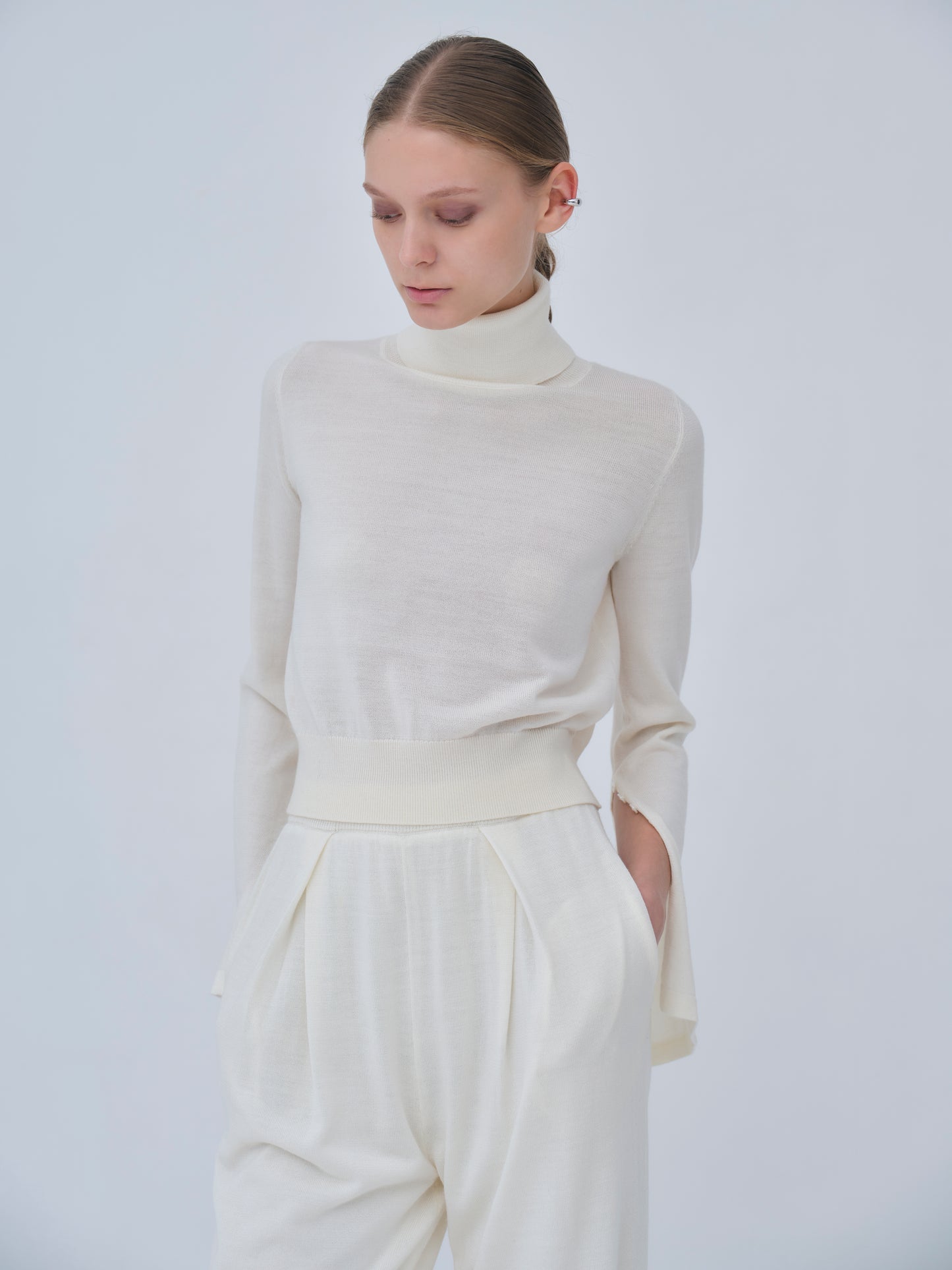 Compact Slit Sleeve Knit